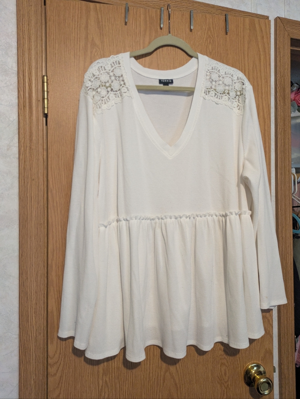 torrid Ivory Lace-Shoulder V-Neck Peplum Tunic